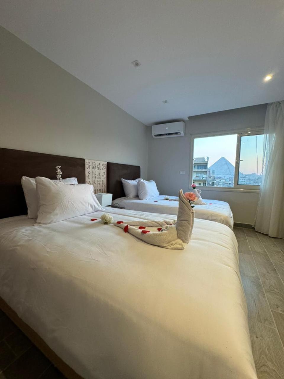 Khufu Pyramids Inn Nazlet el-Sisi ภายนอก รูปภาพ