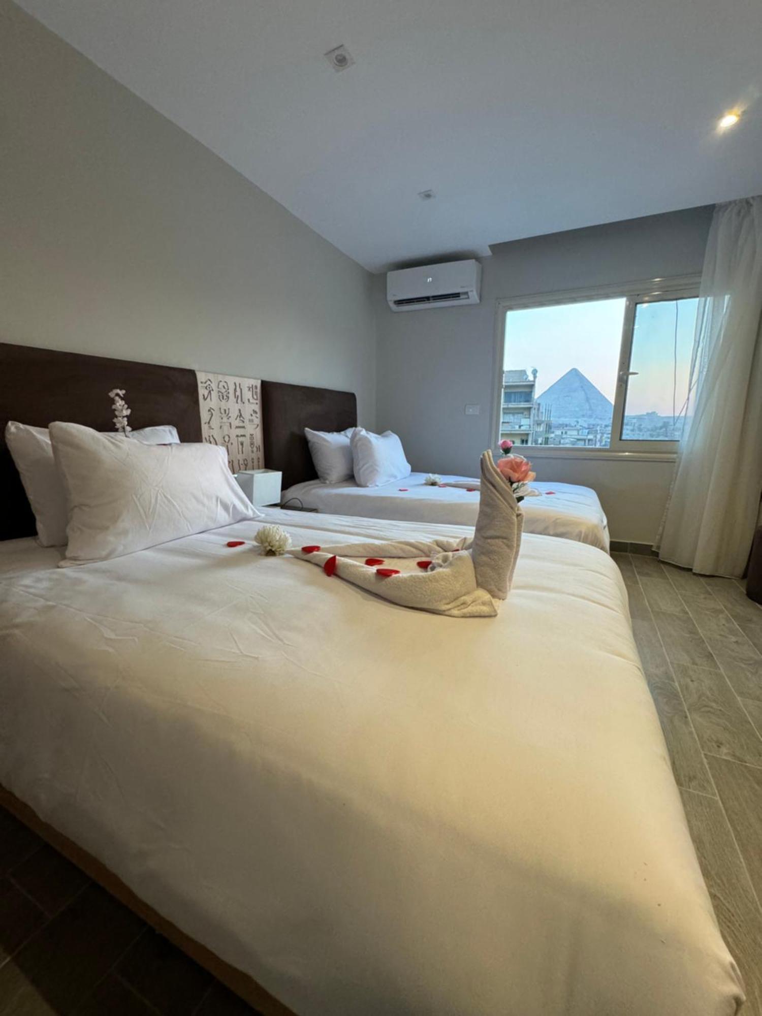Khufu Pyramids Inn Nazlet el-Sisi ภายนอก รูปภาพ